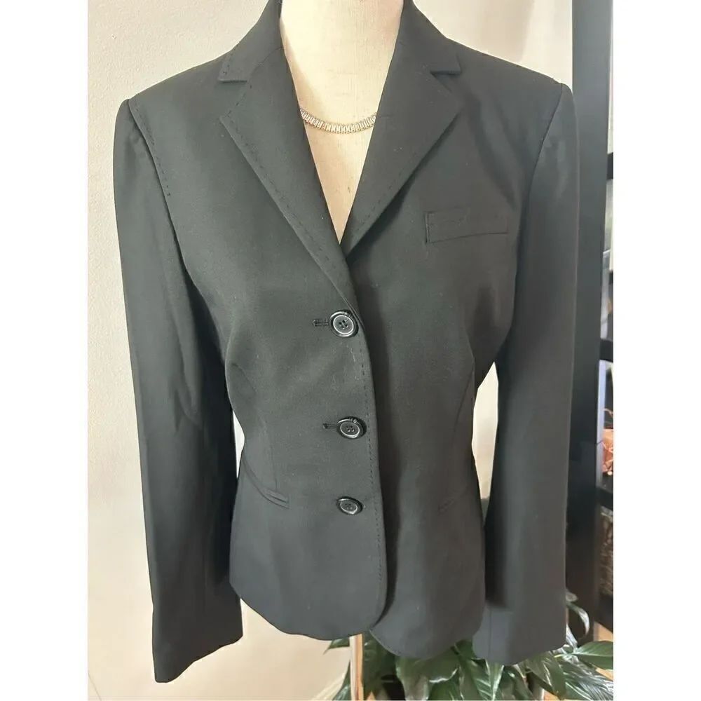 The limited black blazer size 4